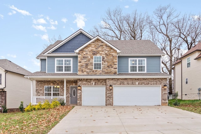 view of front of house featuring a garage and covered porch