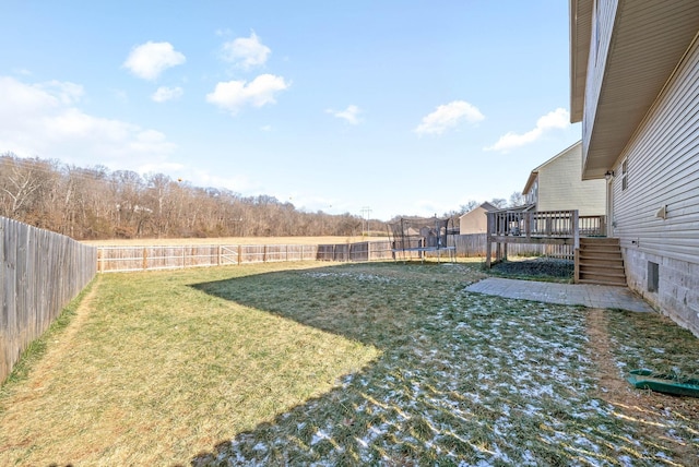 view of yard featuring a trampoline