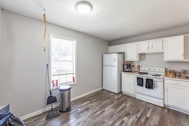 kitchen with white cabinetry, dark wood-type flooring, white appliances, and a textured ceiling