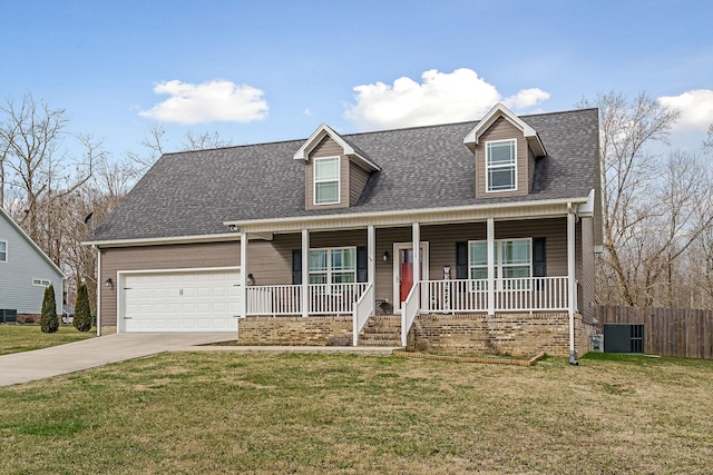 cape cod home featuring a porch, a garage, and a front yard