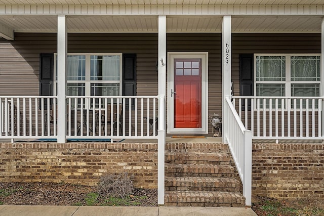 entrance to property with a porch