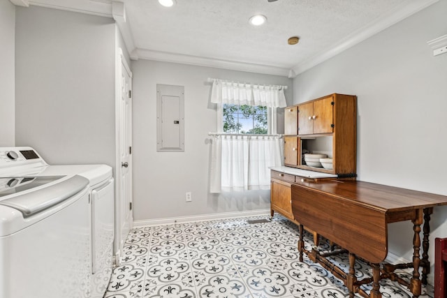 laundry room with a textured ceiling, crown molding, electric panel, and separate washer and dryer