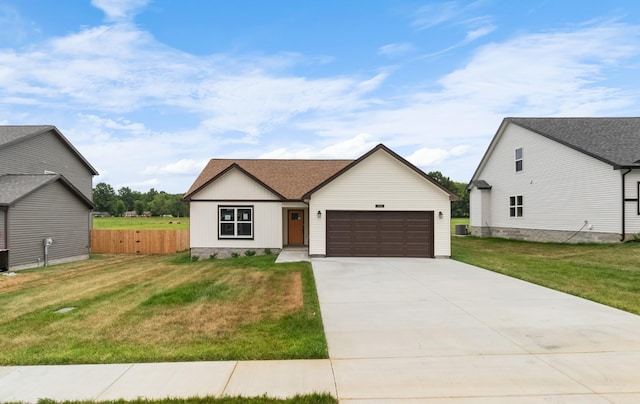 modern farmhouse style home featuring central AC, a front lawn, and a garage