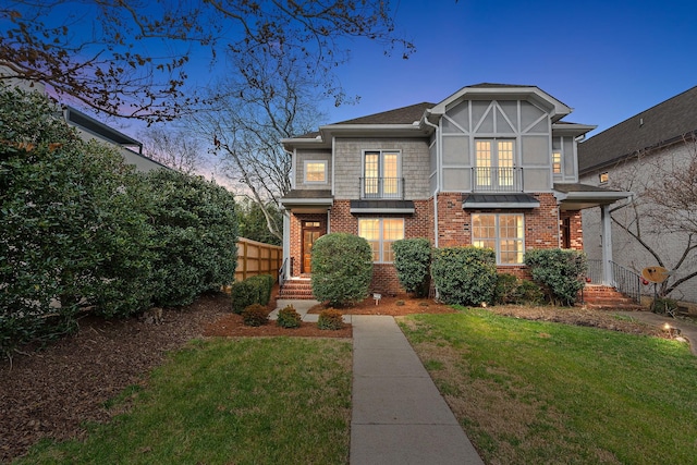 view of front of home with a lawn