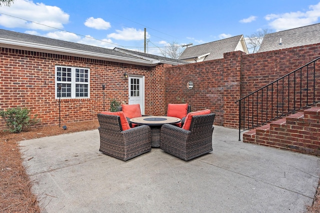 view of patio featuring a fire pit