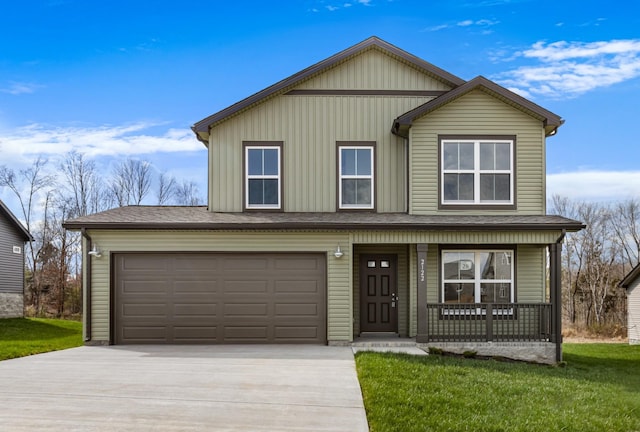 front facade with covered porch, a front yard, and a garage