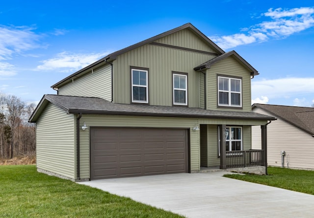 view of property featuring a garage, covered porch, and a front yard