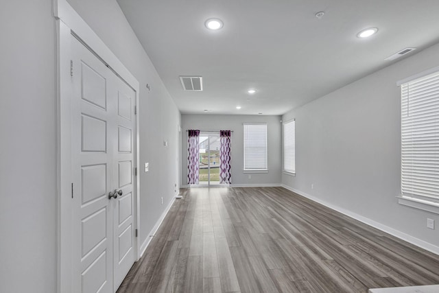 empty room featuring wood-type flooring