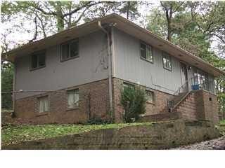 view of home's exterior featuring brick siding