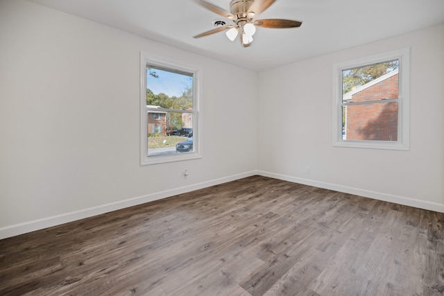 spare room featuring ceiling fan and wood-type flooring