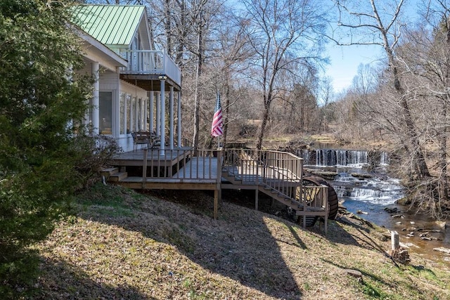 exterior space with stairs and a wooden deck