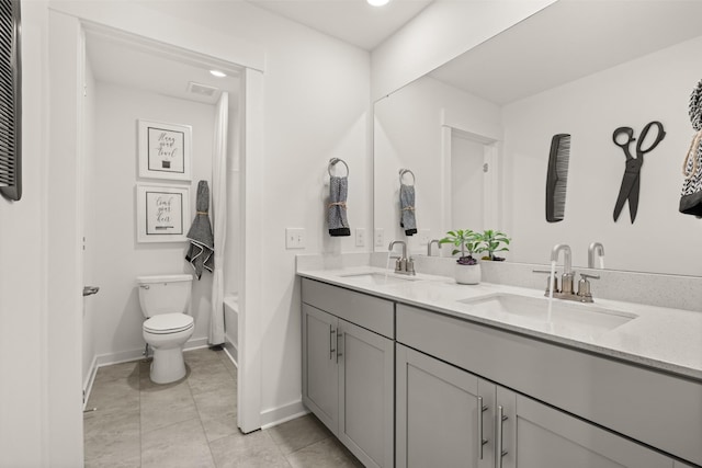 full bathroom with shower / bathing tub combination, vanity, tile patterned flooring, and toilet