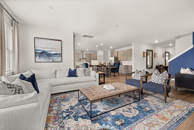 living room with light hardwood / wood-style floors