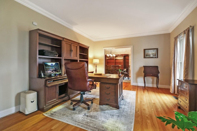 office space featuring light wood-type flooring, an inviting chandelier, and crown molding