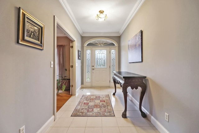 entryway featuring light tile patterned floors and crown molding