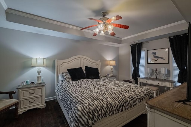 306 Amherst Dr, Tullahoma, TN 37388 - bedroom featuring a tray ceiling, dark wood-type flooring, ornamental molding, a ceiling fan, and baseboards