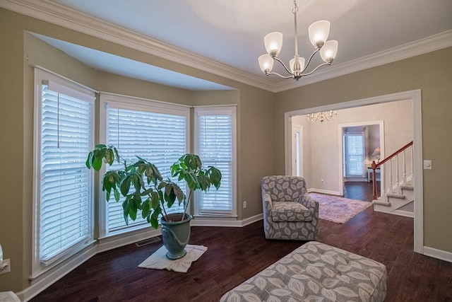 306 Amherst Dr, Tullahoma, TN 37388 - sitting room with a chandelier, baseboards, ornamental molding, wood finished floors, and stairway