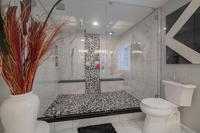 306 Amherst Dr, Tullahoma, TN 37388 - full bathroom featuring toilet, a shower stall, marble look tiles, and recessed lighting