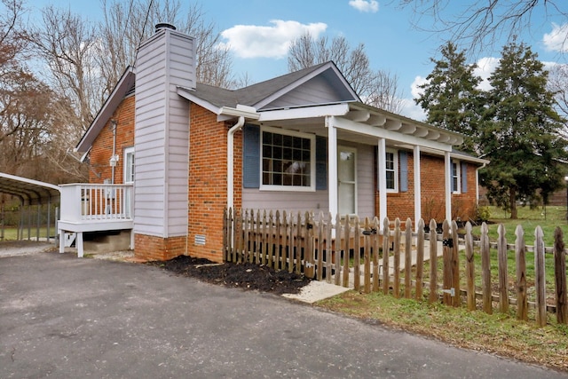 view of front facade featuring a carport