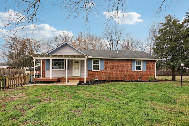 ranch-style home with a carport and a front lawn