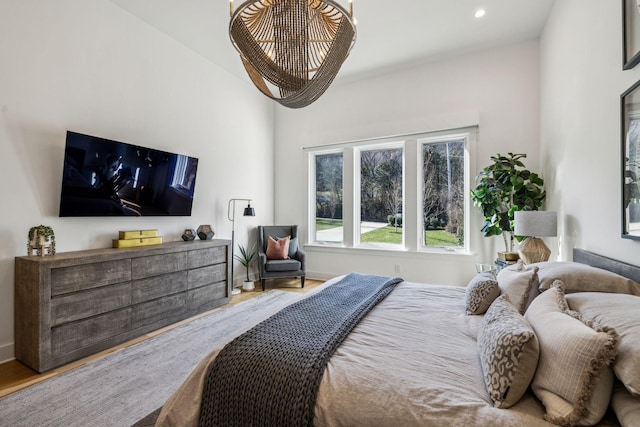 bedroom featuring wood-type flooring