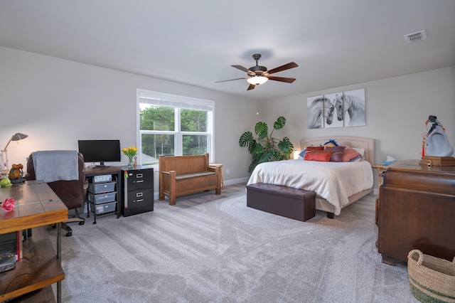 bedroom with light carpet and ceiling fan