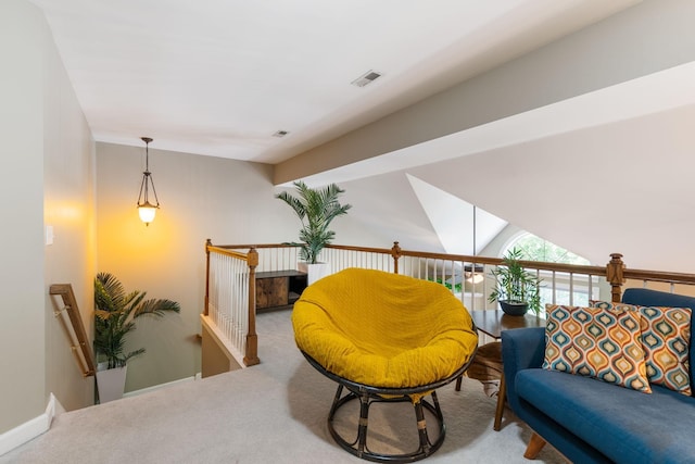 sitting room featuring carpet floors