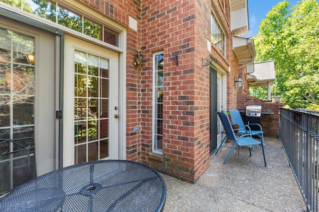 doorway to property featuring a balcony