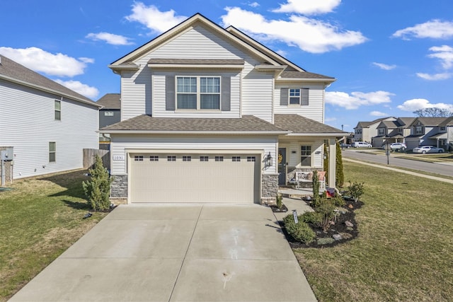 craftsman-style house with driveway, stone siding, a residential view, and a front yard