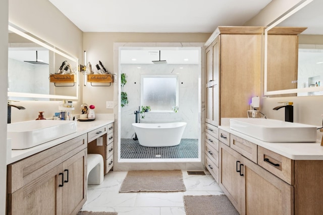 bathroom featuring vanity and a bathtub