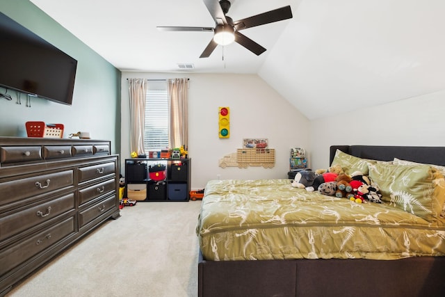 carpeted bedroom featuring vaulted ceiling and ceiling fan