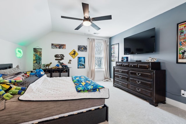 carpeted bedroom with lofted ceiling and ceiling fan