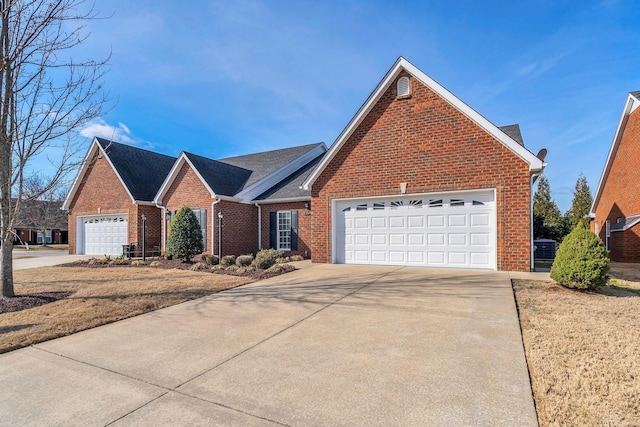 front of property featuring central air condition unit and a garage