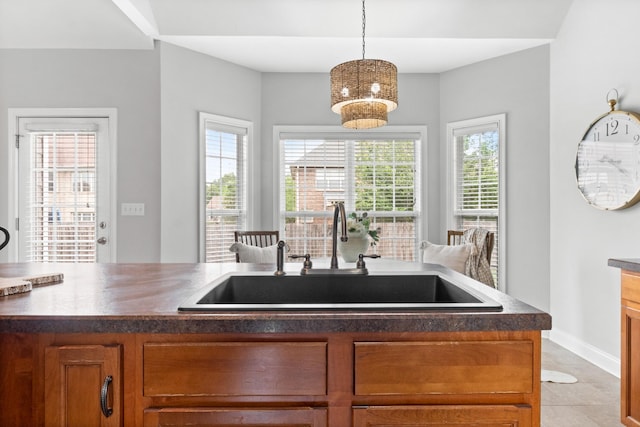 kitchen with sink and hanging light fixtures