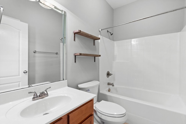 full bathroom featuring toilet, vanity, and shower / bathing tub combination