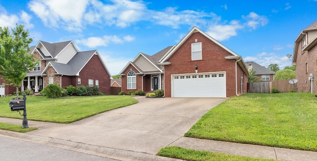 front of property featuring a front lawn and a garage