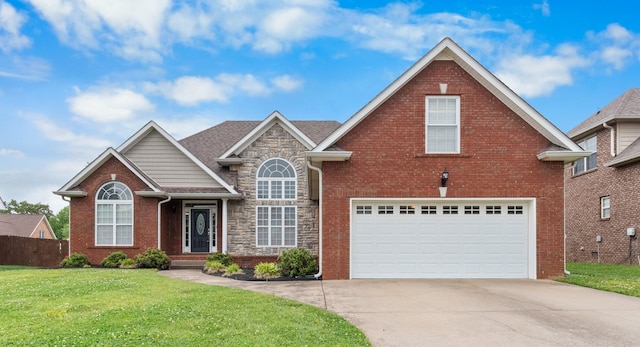 view of front property with a front lawn and a garage