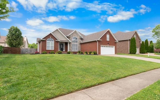 single story home with a front lawn and a garage