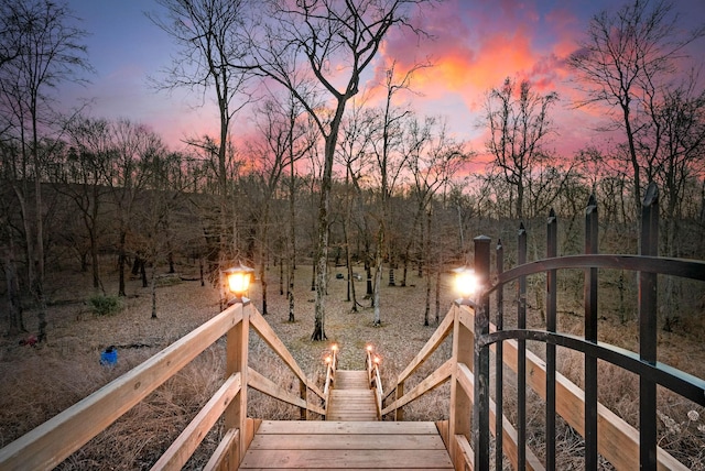 deck at dusk with a gate