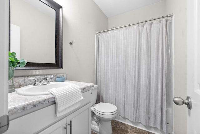 full bathroom with shower / bath combination with curtain, vanity, toilet, and tile patterned floors