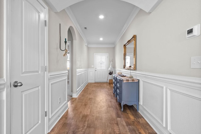 hallway with crown molding and dark hardwood / wood-style floors