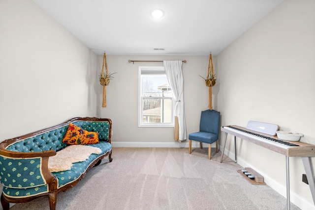 sitting room with light carpet