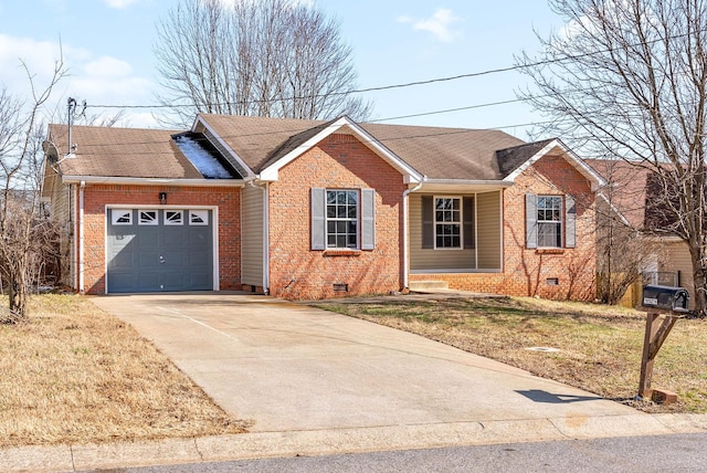 ranch-style home with a front yard and a garage