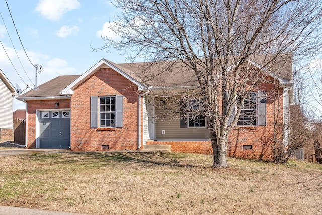 view of front of home with a front lawn and a garage