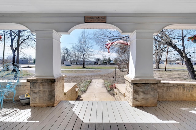 wooden terrace featuring a porch