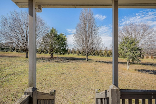 view of yard with a rural view