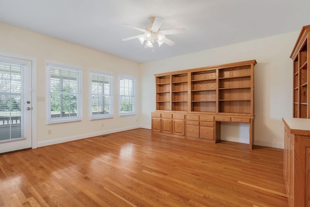 interior space featuring light hardwood / wood-style flooring and ceiling fan