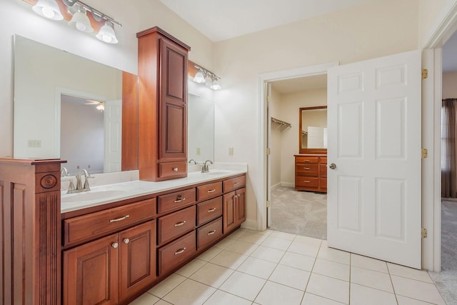 bathroom with vanity, tile patterned flooring, and ceiling fan