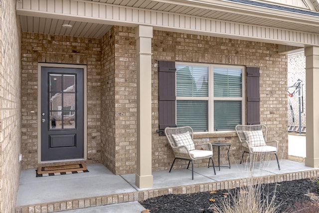 doorway to property featuring a porch