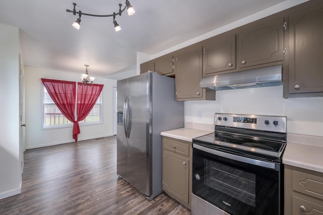 kitchen featuring under cabinet range hood, appliances with stainless steel finishes, light countertops, and dark wood finished floors